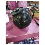 Ceramic pitcher. Unmarked dry foot.