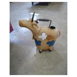 Cow watering can/yard ornament.
