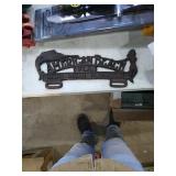 Modern cast iron sign.