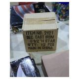 1 box of 12 small modern cast iron stars.