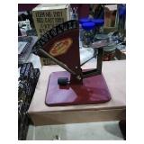 Modern egg scale with Cyclone Advertisement.