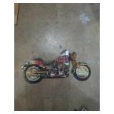 Metal motorcycle sign. Measures 23in long