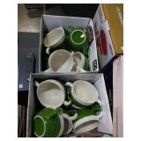 Group of green and white mugs