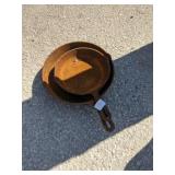 Two cast iron skillets
No name