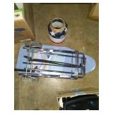 Suitcase holder, ironing board,funky jar