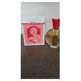 DESIGNER FRAGRANCE VERSION OF WHITE SHOULDERS.