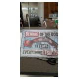 BEWARE OF THE DOG. IT EATS EVERYTHING I SHOOT.