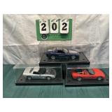 (3) Assorted PROMO Corvette Cars In Cases Lot 7