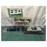 (3) Assorted PROMO Corvette Cars In Cases Lot 31
