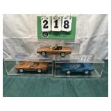 (3) Assorted PROMO Corvette Cars In Cases Lot 23