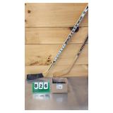 Two Vintage Hockey Sticks And Pucks