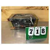 Four Small Diecast Cars Nib