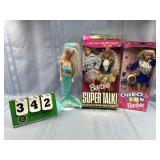 (4) Barbie Dolls