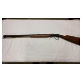 Muzzle loading rifle with bottom hammer. Muzzle loading rifle with bottom hammer.
