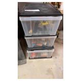 3 drawer organizer with sporting related items. 3 drawer organizer with sporting related items.