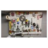 Peg board lot full of miscellaneous tools. Peg board lot full of miscellaneous tools.