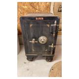 Sinn safe on steel wheels, dimensions 24" Tall,