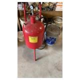 Sand blaster with buckets of blasting media. Sand blaster with buckets of blasting media.