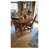 Amish built Oak table with 2 leaves and 4 chairs