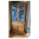 Custom built oak china cabinet with lighting and