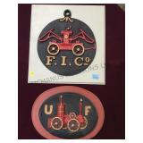 PAIR OF CAST IRON FIREMAN PLAQUES ON WOOD LOCAL