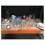 Large Lot of glassware including cups vases bowls