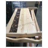 Wooden and cast iron king size bed frame with a