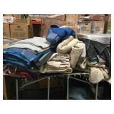 Tabletop of assorted moving blankets McManus
