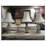 Pair of matching glass based table lamps with