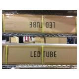 Four boxes of 4 foot fluorescent light tubes