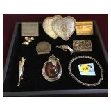 Pendent, pins, mini gun & more.