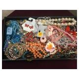 Tray of fashion jewelry, mostly glass or stone