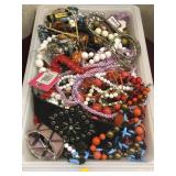 Tub full of costume jewelry
