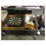 Bottom shelf incl. dart board and more local