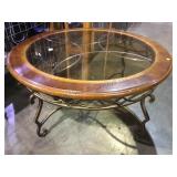 Metal based wood and glass top circular coffee