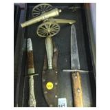 CUSTOM-MADE KNIVES & BRASS CANNON