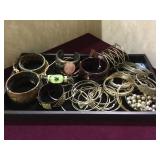 Tray lot of costume bracelets