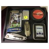 Lot incl. cowboys zippo, hockey puck, knives and