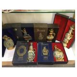 Lot of 6 Jim Beam collectors decanters in display