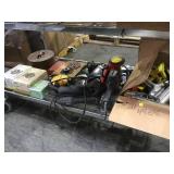 Bottom shelf assorted power tools, hardware and
