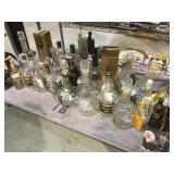 Table bottom large lot Jack Daniels decanters,