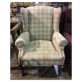 Plaid wing back armchair with hobnail accents