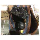 Camera bag with Konica camera, telephoto lenses
