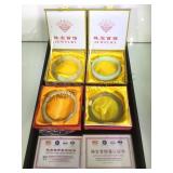 4 JADE BANGLE BRACELETS, W/ BOXES