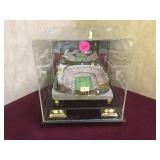 Miniature model of football stadium in display