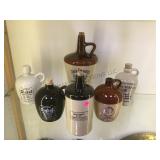 Lot of whiskey crocks incl. Jack Daniels, George