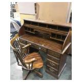 Wooden rolltop desk with drawers and rolling