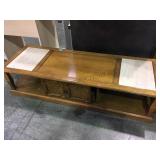 Low wooden coffee table with lower storage and