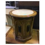 Circular wooden side table with lower storage and