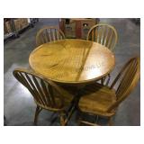 Round wooden table with four chairs local pick up